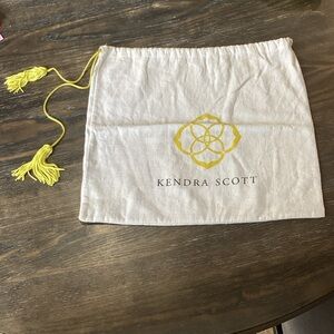 Kendra Scott Cream Dust Bag with Yellow Tassels